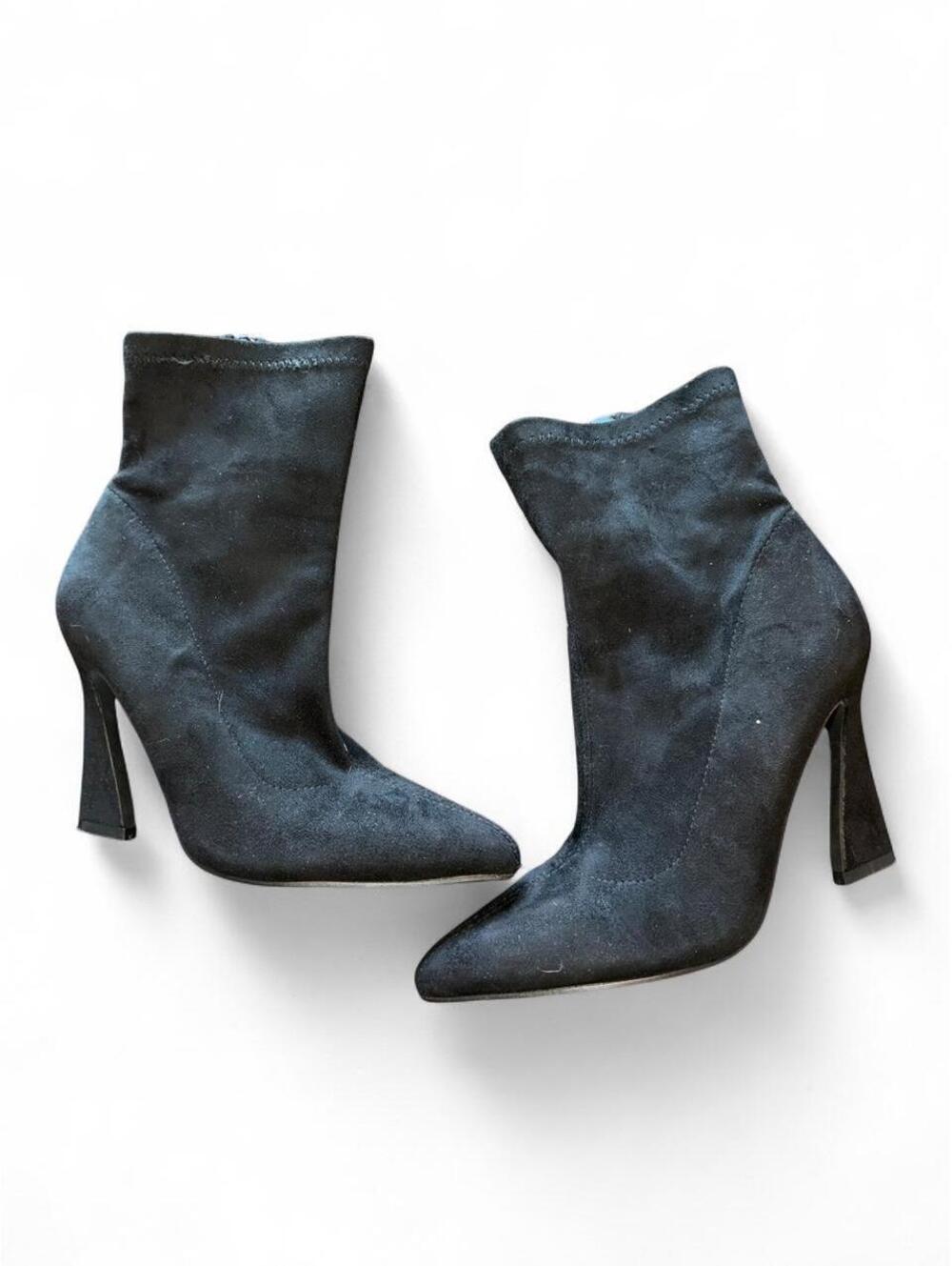 Black faux-suede heeled sock boots with a skinny heel